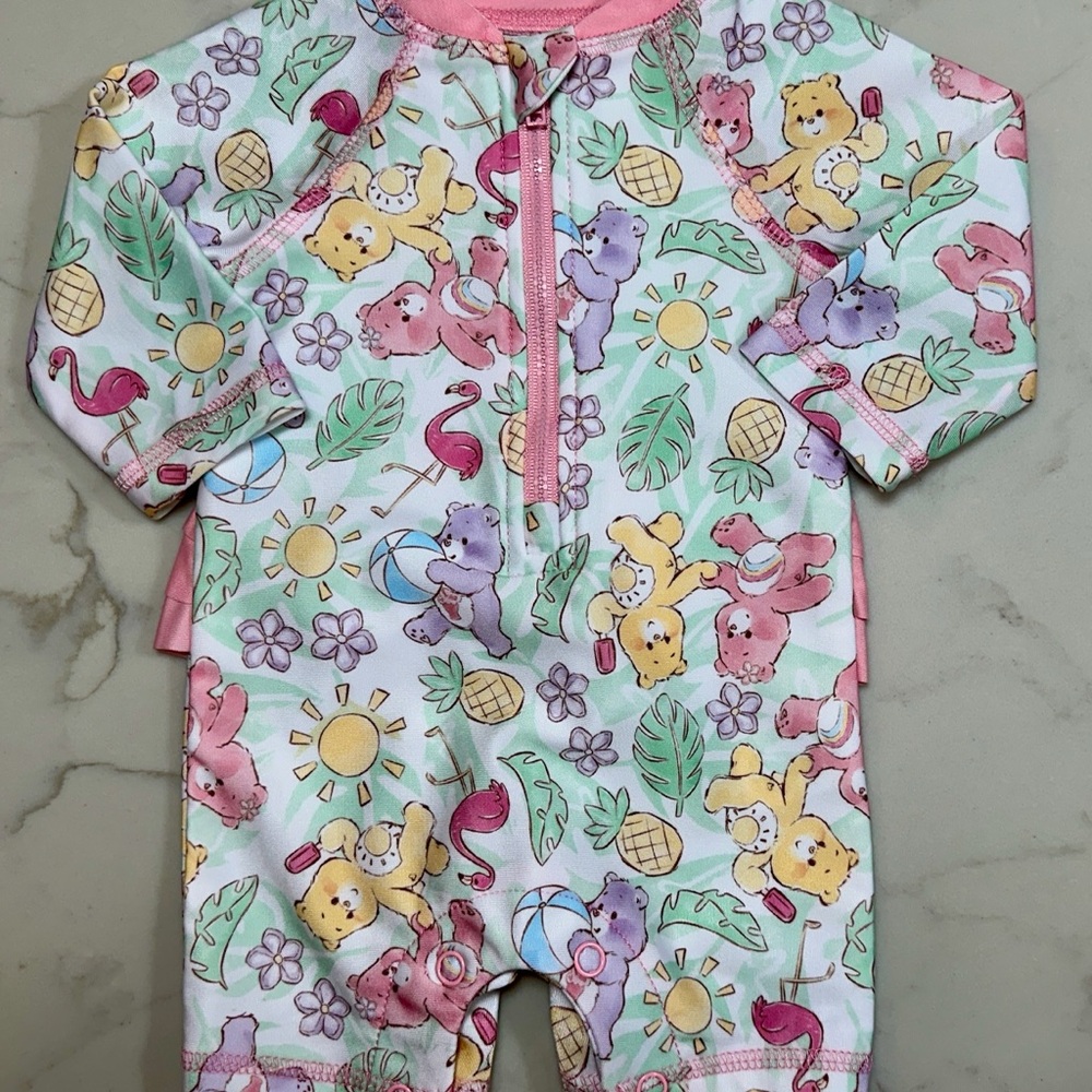 Care Bears Infant One Piece Ruffle Butt Swimsuit Rash Guard